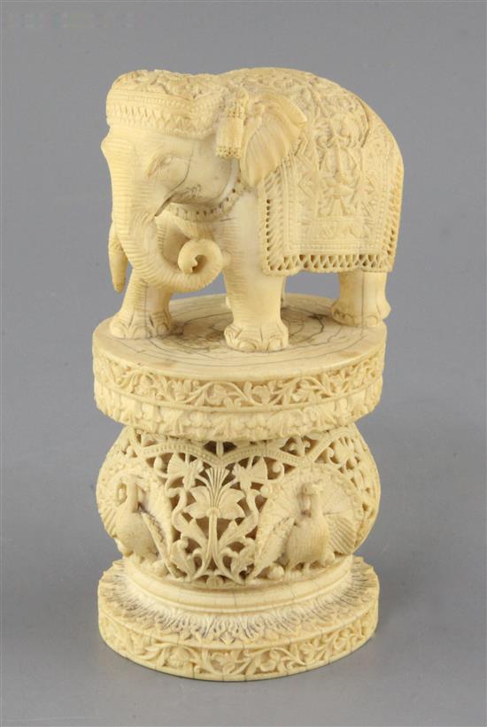 An Indian or Burmese ivory figure of an elephant, late 19th century, height 20cm, one tusk lacking